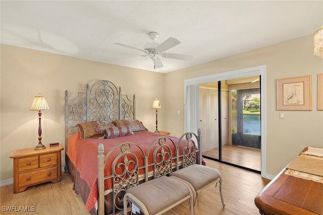 8411 Charter Club Cir Unit 1, Fort Myers, FL 33919 - bedroom with access to exterior, light wood-style floors, ceiling fan, and baseboards