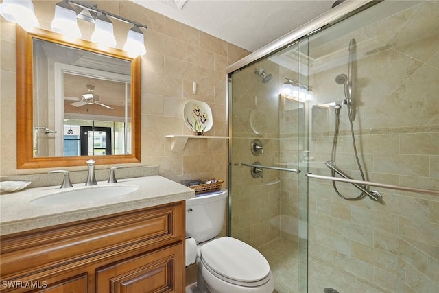8411 Charter Club Cir Unit 1, Fort Myers, FL 33919 - full bath featuring tile walls, vanity, toilet, and a stall shower