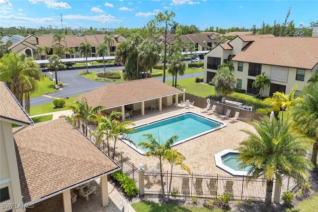 8411 Charter Club Cir Unit 1, Fort Myers, FL 33919 - community pool featuring a residential view and a patio area