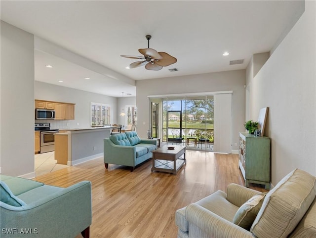 10230 Cobble Hill Rd, Bonita Springs, FL 34135 - living area featuring a ceiling fan, light wood-style floors, baseboards, and recessed lighting