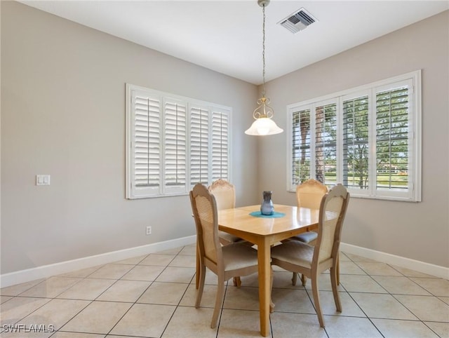 10230 Cobble Hill Rd, Bonita Springs, FL 34135 - dining room featuring baseboards and light tile patterned floors