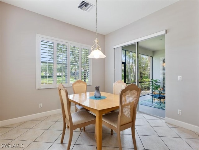 10230 Cobble Hill Rd, Bonita Springs, FL 34135 - dining space with light tile patterned flooring and baseboards
