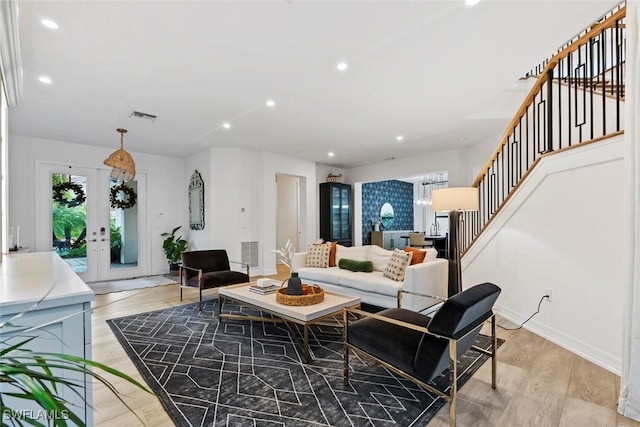 4083 Aspen Chase Dr, Naples, FL 34119 - living area featuring stairway, light wood-style flooring, recessed lighting, and french doors