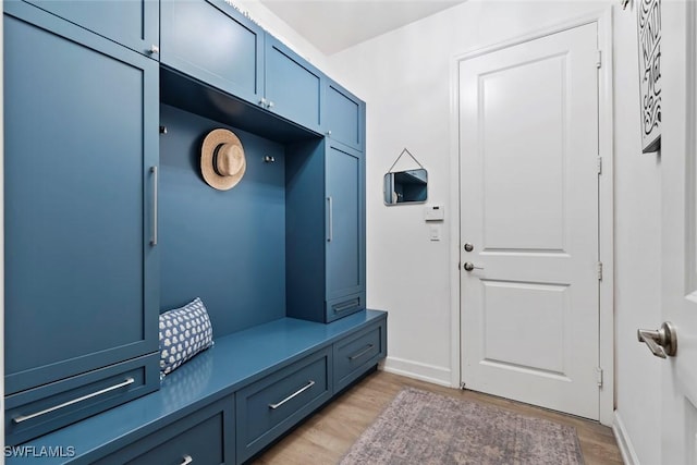 4083 Aspen Chase Dr, Naples, FL 34119 - mudroom featuring light wood finished floors and baseboards