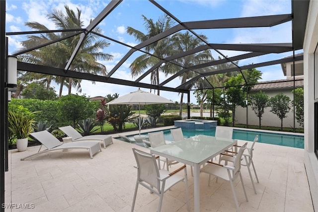 4083 Aspen Chase Dr, Naples, FL 34119 - view of swimming pool featuring a patio area, a pool with connected hot tub, outdoor dining space, and glass enclosure