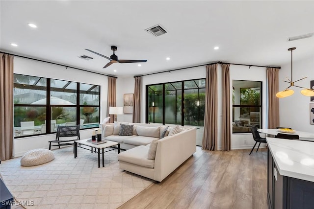 4083 Aspen Chase Dr, Naples, FL 34119 - living area featuring light wood-style floors, recessed lighting, and a ceiling fan