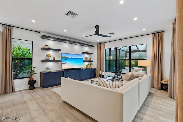 4083 Aspen Chase Dr, Naples, FL 34119 - living room featuring light wood-style flooring, a ceiling fan, plenty of natural light, and recessed lighting