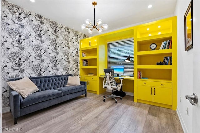 4083 Aspen Chase Dr, Naples, FL 34119 - office space featuring light wood-type flooring, an accent wall, baseboards, a chandelier, and wallpapered walls