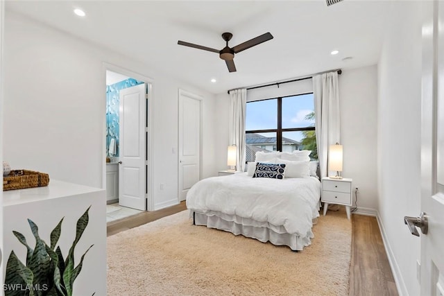 4083 Aspen Chase Dr, Naples, FL 34119 - bedroom featuring light wood-style floors, recessed lighting, baseboards, ensuite bath, and a ceiling fan
