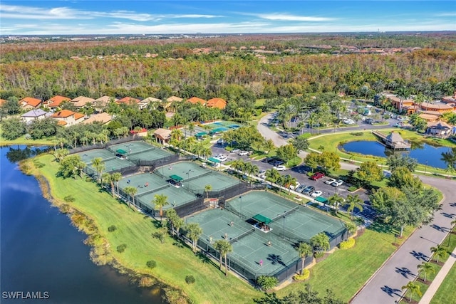 11923 Adoncia Way Unit 2802, Fort Myers, FL 33912 - view of property location with a nearby body of water and a heavily wooded area