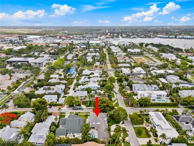 687 9th Ave S, Naples, FL 34102 - aerial perspective of suburban area featuring a large body of water