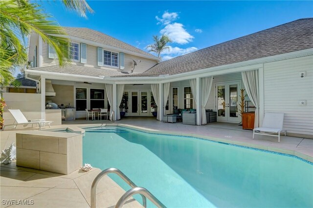 687 9th Ave S, Naples, FL 34102 - back of house with french doors, area for grilling, a ceiling fan, an outdoor pool, and a patio