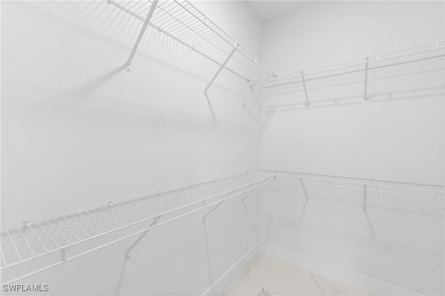 2813 38th St SW, Lehigh Acres, FL 33976 - spacious closet with light marble finish flooring