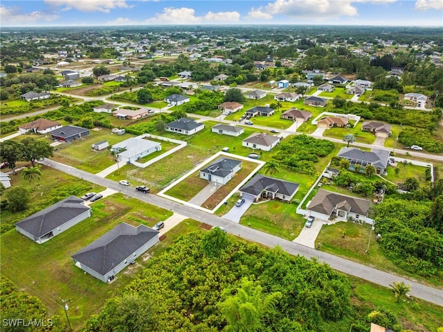 2813 38th St SW, Lehigh Acres, FL 33976 - aerial view of property and surrounding area with nearby suburban area