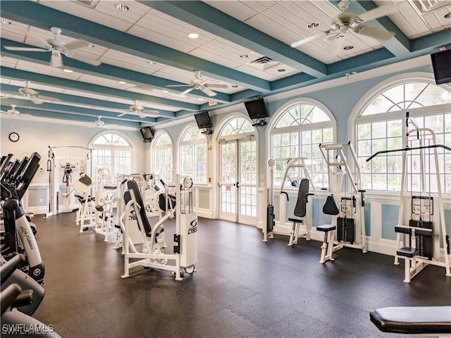 12860 Seaside Key Ct, North Fort Myers, FL 33903 - exercise room with ceiling fan and beamed ceiling