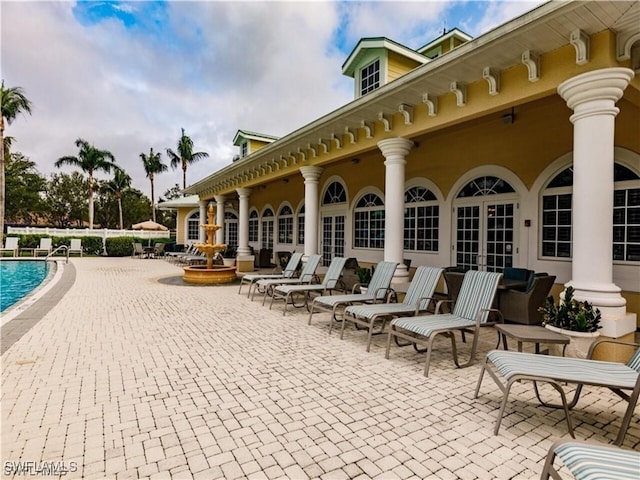 12860 Seaside Key Ct, North Fort Myers, FL 33903 - view of patio / terrace with a community pool