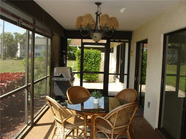 4802 Lakewood Blvd Unit B13, Naples, FL 34112 - sunroom / solarium with a chandelier