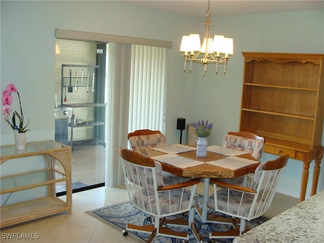 4802 Lakewood Blvd Unit B13, Naples, FL 34112 - dining area featuring a chandelier