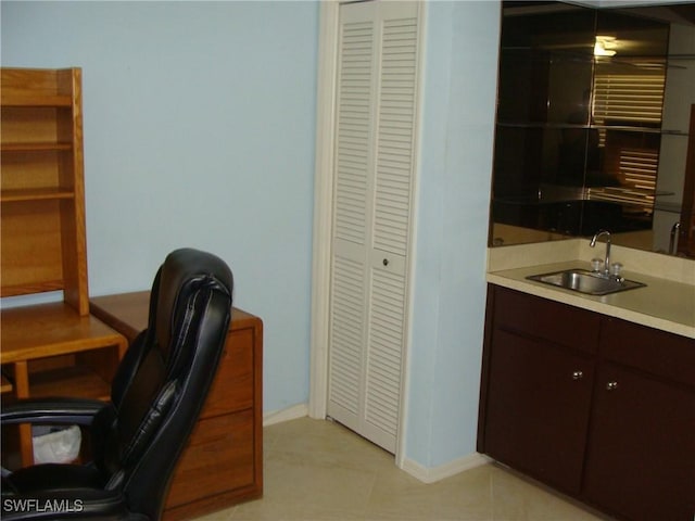 4802 Lakewood Blvd Unit B13, Naples, FL 34112 - home office featuring a sink and baseboards
