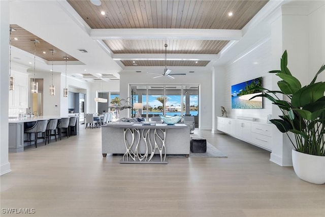 1761 Ludlow Rd, Marco Island, FL 34145 - living area featuring wooden ceiling with exposed beams, a ceiling fan, light wood finished floors, and recessed lighting