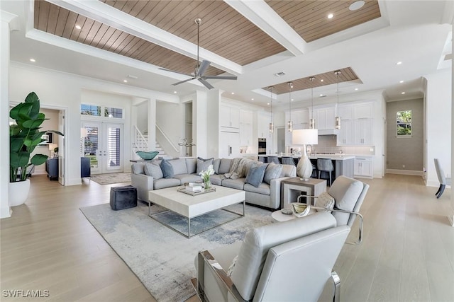 1761 Ludlow Rd, Marco Island, FL 34145 - living room with light wood-style flooring, baseboards, french doors, wood ceiling with exposed beams, and a ceiling fan
