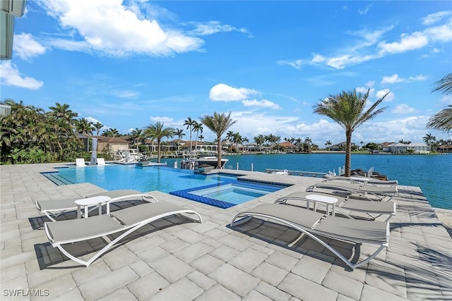1761 Ludlow Rd, Marco Island, FL 34145 - view of pool featuring an in-ground hot tub, a patio area, an infinity pool, and a water view
