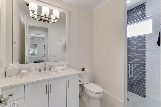 1761 Ludlow Rd, Marco Island, FL 34145 - bathroom with a shower stall, vanity, toilet, a chandelier, and baseboards