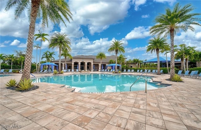 11704 Stonecreek Cir, Fort Myers, FL 33913 - community pool with a gazebo and a patio area