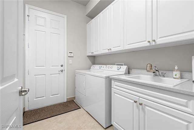 11704 Stonecreek Cir, Fort Myers, FL 33913 - washroom with cabinet space, washing machine and dryer, and light tile patterned flooring