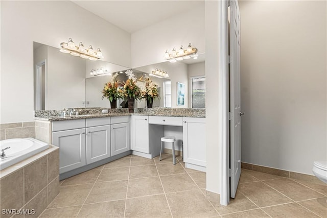 11704 Stonecreek Cir, Fort Myers, FL 33913 - full bath featuring a bath, tile patterned floors, vanity, and toilet