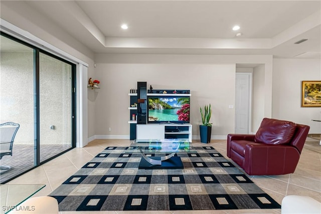 11704 Stonecreek Cir, Fort Myers, FL 33913 - living area with a raised ceiling, tile patterned floors, baseboards, and recessed lighting