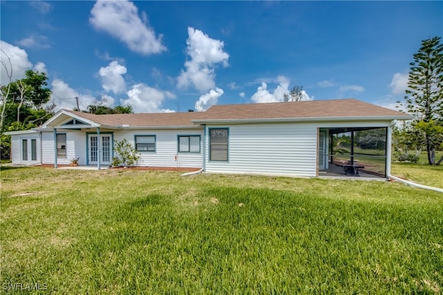 4149 Shellcrest Rd, Saint James City, FL 33956 - back of house featuring french doors and a yard