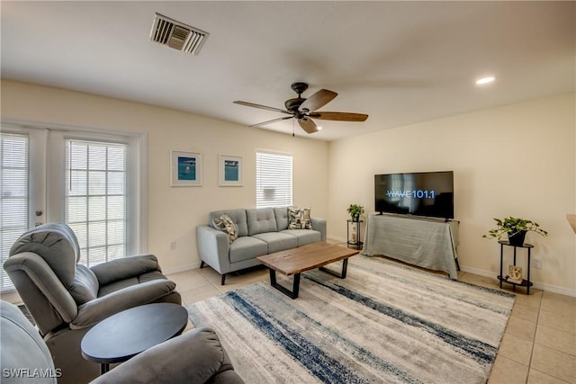 4149 Shellcrest Rd, Saint James City, FL 33956 - living area with light tile patterned flooring, healthy amount of natural light, a ceiling fan, baseboards, and recessed lighting