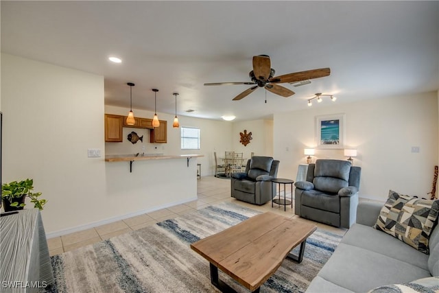 4149 Shellcrest Rd, Saint James City, FL 33956 - living room with light tile patterned floors, a ceiling fan, recessed lighting, and baseboards