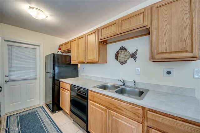 4149 Shellcrest Rd, Saint James City, FL 33956 - kitchen with black appliances, a sink, light countertops, and light tile patterned floors
