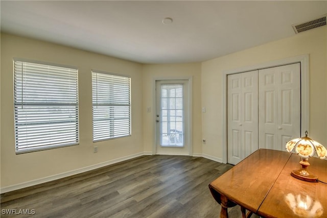 4149 Shellcrest Rd, Saint James City, FL 33956 - home office with dark wood-style floors and baseboards