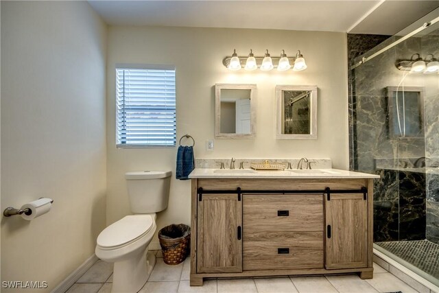 4149 Shellcrest Rd, Saint James City, FL 33956 - bathroom featuring double vanity, toilet, a shower stall, and tile patterned flooring