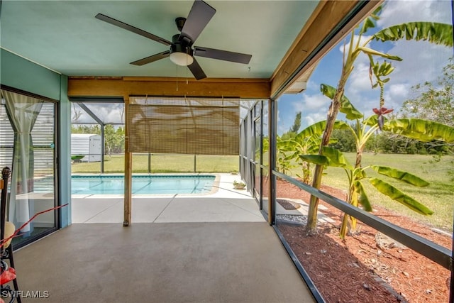 4149 Shellcrest Rd, Saint James City, FL 33956 - unfurnished sunroom with ceiling fan and a swimming pool