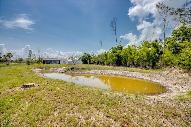 4149 Shellcrest Rd, Saint James City, FL 33956 - view of green lawn with a water view