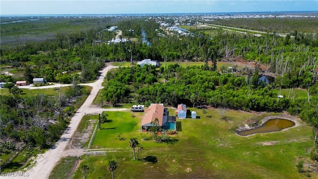 4149 Shellcrest Rd, Saint James City, FL 33956 - bird's eye view of a forest and a nearby body of water