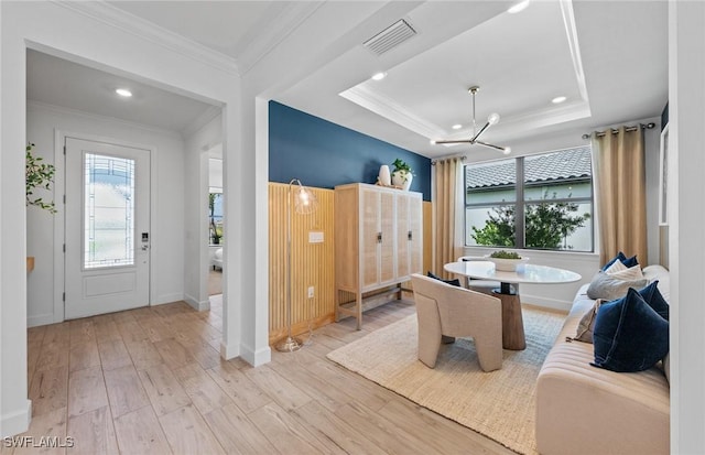 7049 Chapel Creek Ln, North Fort Myers, FL 33917 - dining room with a chandelier, light wood-style flooring, ornamental molding, recessed lighting, and baseboards