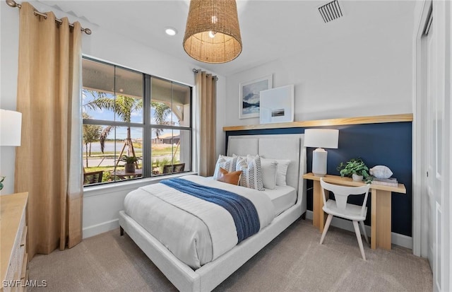 7049 Chapel Creek Ln, North Fort Myers, FL 33917 - carpeted bedroom featuring baseboards