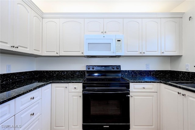 1100 8th Ave S Unit 309C, Naples, FL 34102 - kitchen featuring white microwave, black electric range oven, white cabinetry, and dark stone counters