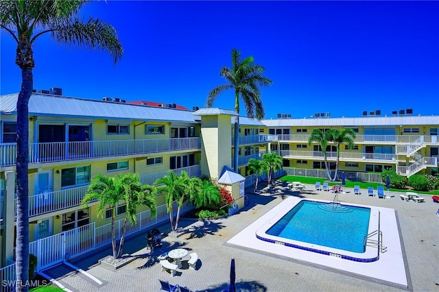1100 8th Ave S Unit 309C, Naples, FL 34102 - community pool featuring a patio area