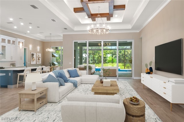 14302 Charthouse Cir, Naples, FL 34114 - living area featuring a chandelier, light wood-style floors, crown molding, coffered ceiling, and a towering ceiling
