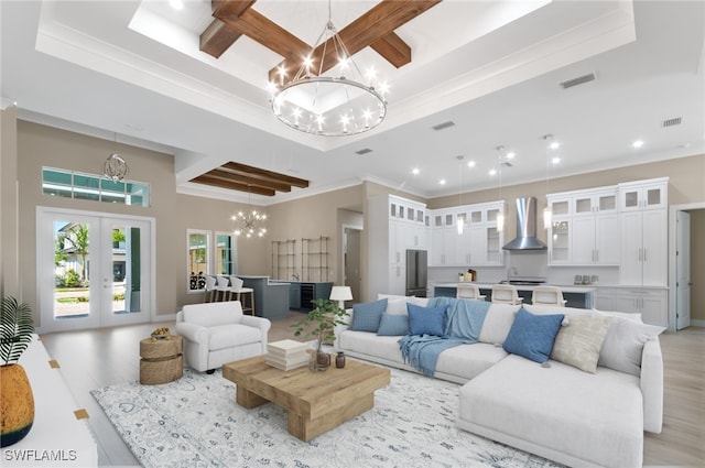 14302 Charthouse Cir, Naples, FL 34114 - living area featuring a chandelier, light wood-type flooring, ornamental molding, a raised ceiling, and recessed lighting