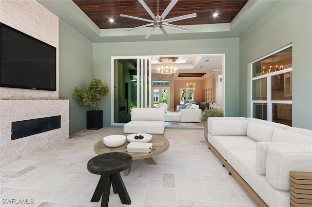 14302 Charthouse Cir, Naples, FL 34114 - view of patio with an outdoor living space with a fireplace and a ceiling fan