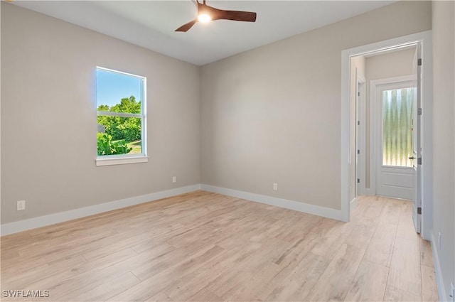 14302 Charthouse Cir, Naples, FL 34114 - empty room featuring healthy amount of natural light, a ceiling fan, and light wood-type flooring