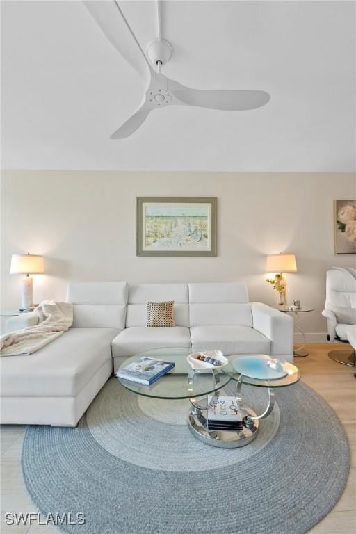 460 Broad Ave S Unit H460, Naples, FL 34102 - living area featuring a ceiling fan and baseboards