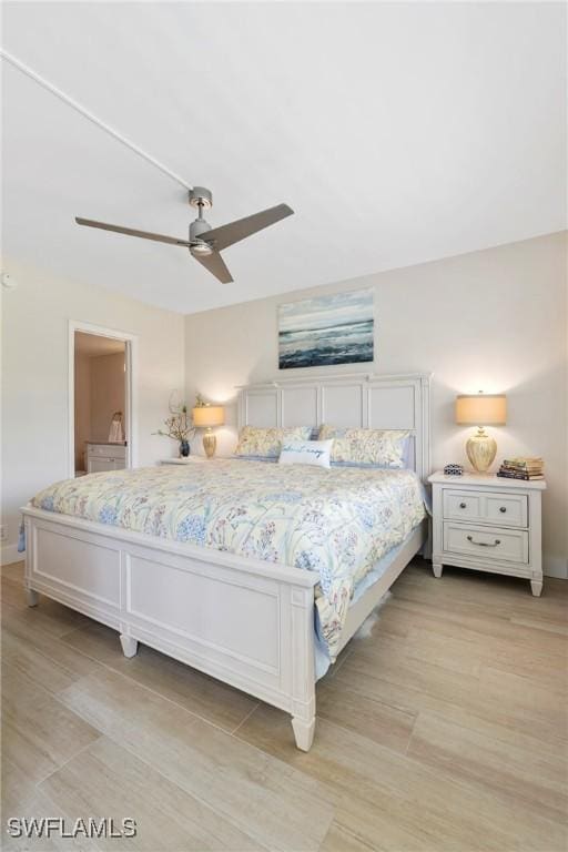 460 Broad Ave S Unit H460, Naples, FL 34102 - bedroom with light wood-style flooring and a ceiling fan